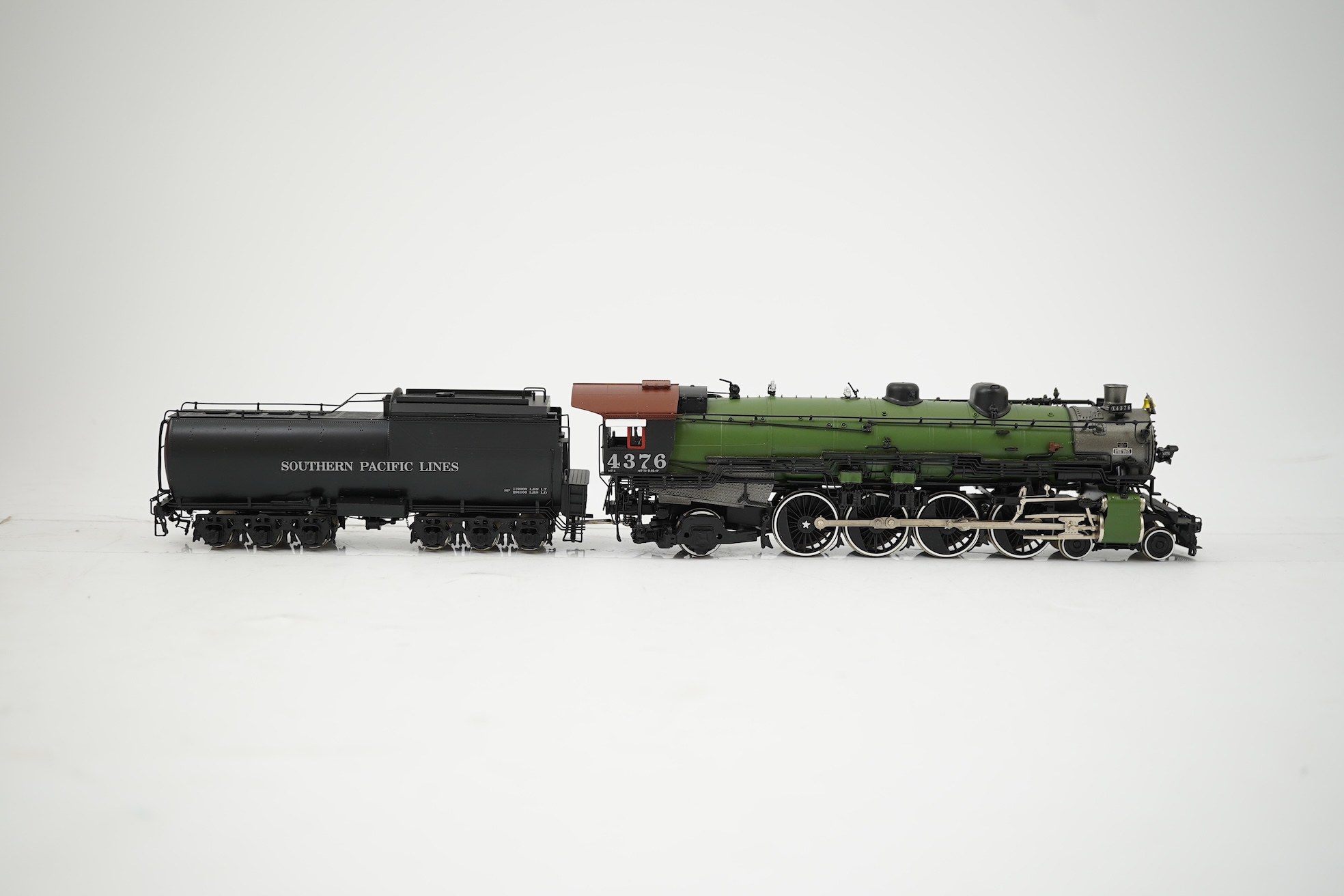 A boxed HO gauge Key Imports model of Southern Pacific Lines MT-5, 4376, 4-8-2 tender locomotive, powered for two rail operation.